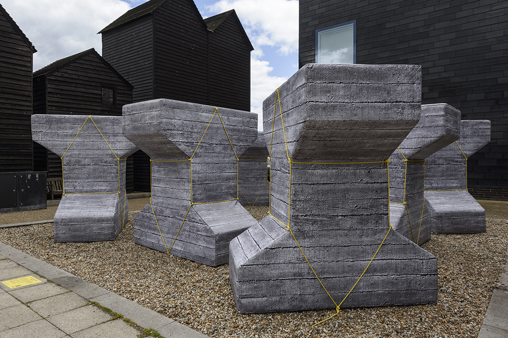 A collection of eight identical structures located in a small public square just outside Hastings Contemporary